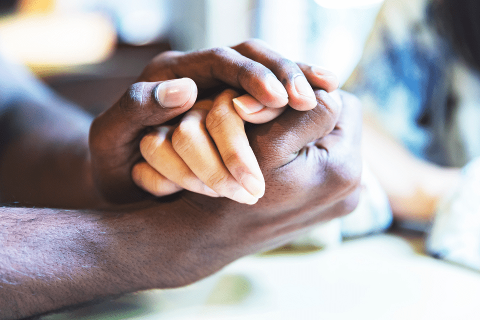 Filipina Woman and African-American Man Holding Hands