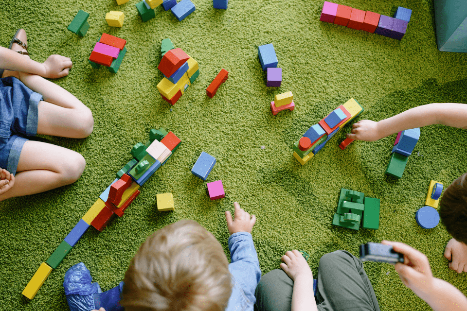 Top View of Children Playing with Blocks - Building Blocks to True Love - Blossoms Dating Blog