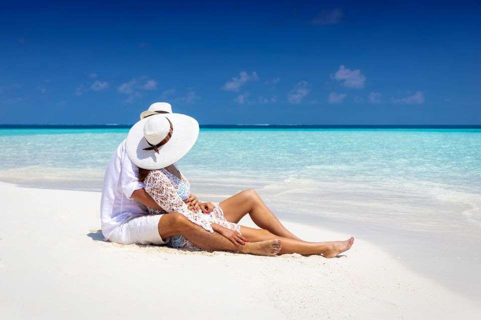 A Couple on Their Honeymoon by the Beach 