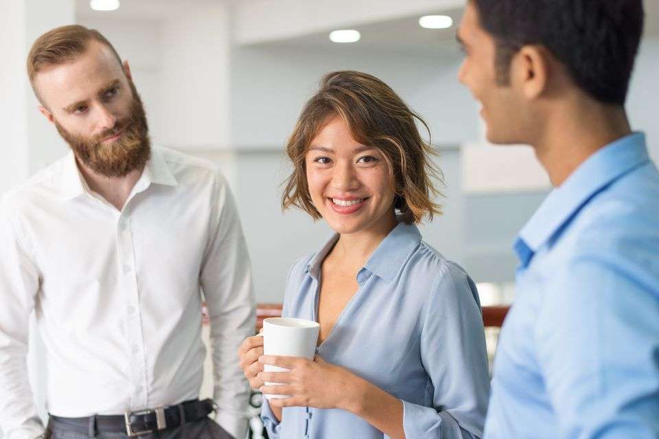 Pretty Filipina Lady Taking a Coffee Break with Colleagues - What Makes an Asian Woman Exceptional Blossoms Dating Blog