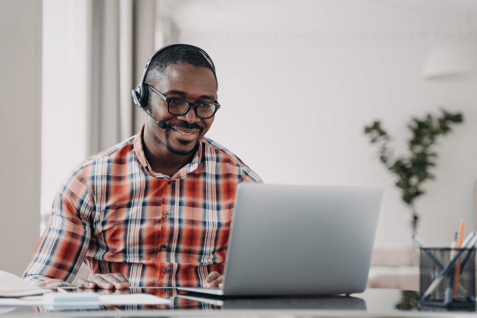 African American Man Wearing a Headset Learning a Language 