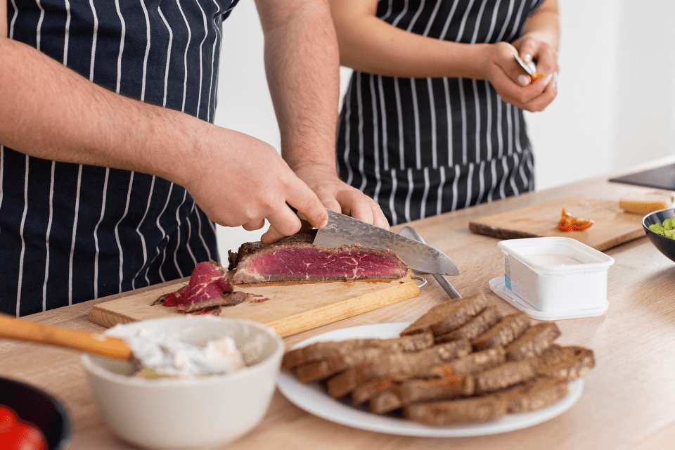 Close up of Couple Cooking Together