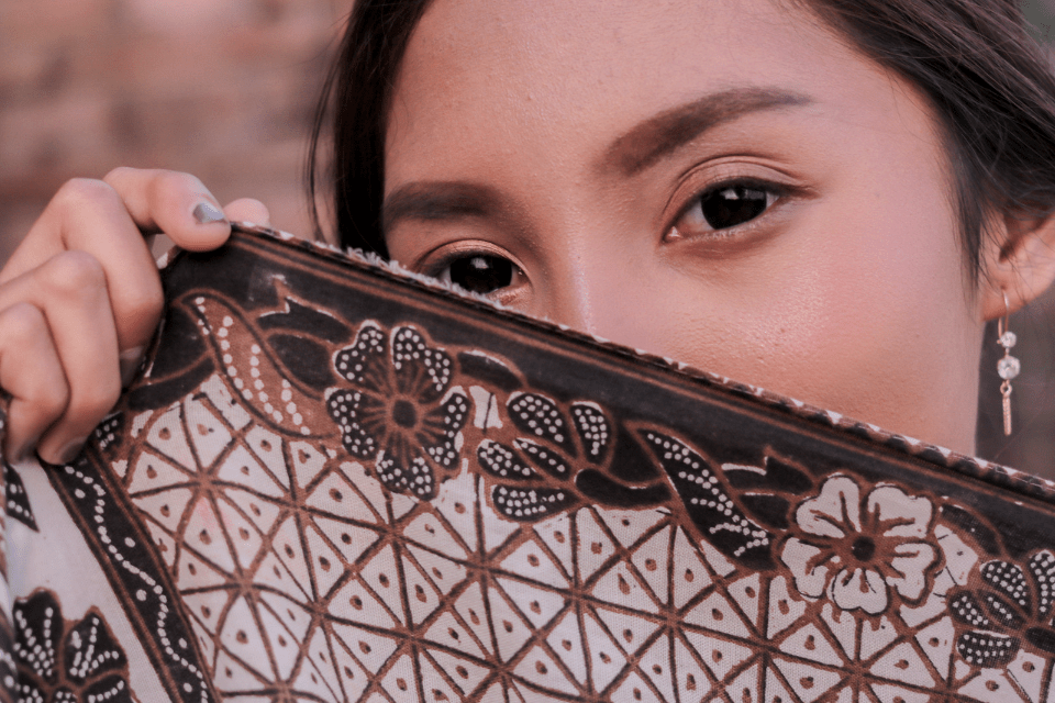 Filipina Hiding Behind Batik Scarf