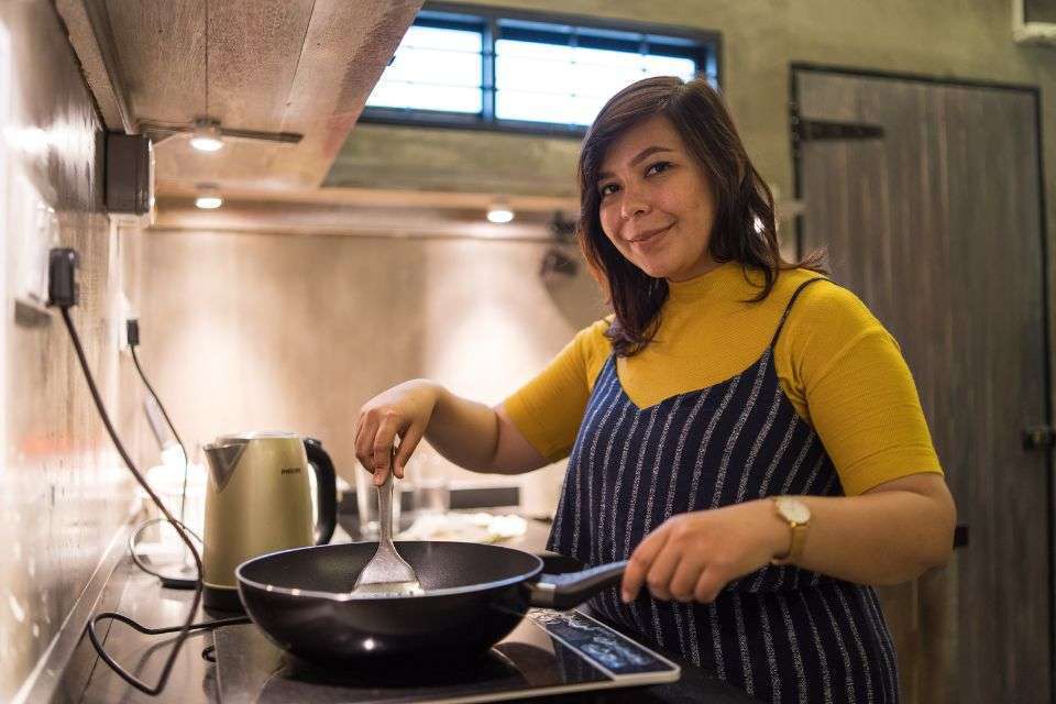 Filipino Woman Cooking in Her Kitchen