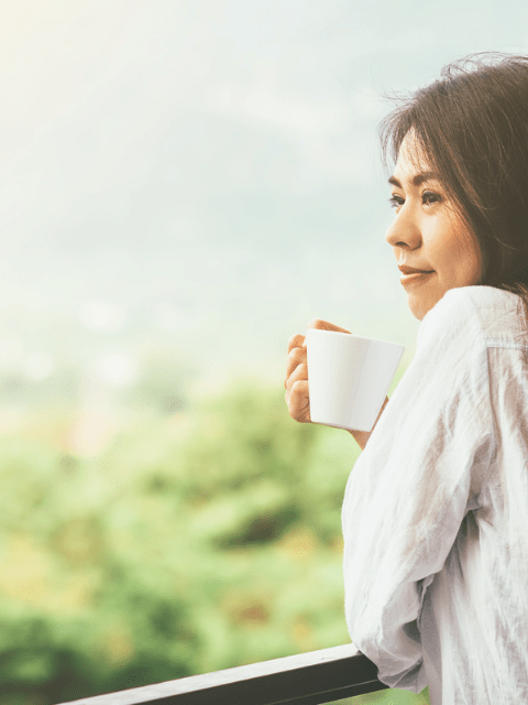 Filipino Woman Drinking Coffee in the Morning