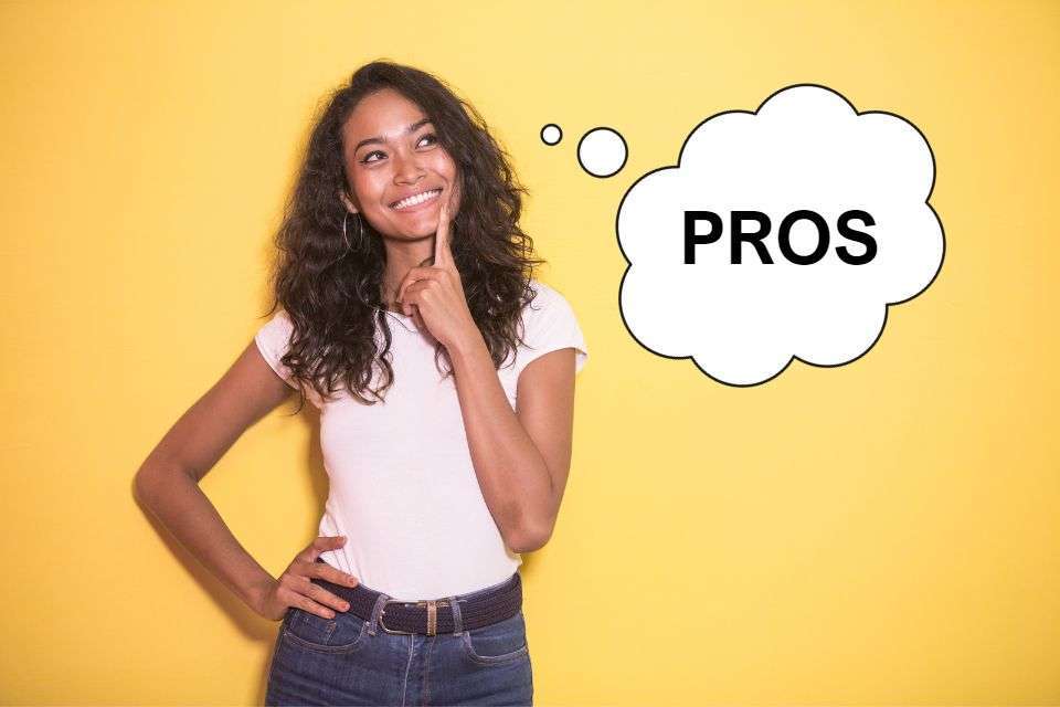 Filipino Woman Thinking of the Pros of Dating Her - The Pros and Cons of Dating a Filipino Woman - Blossoms Dating Blog