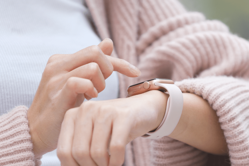 Filipino Woman Using Her Smartwatch