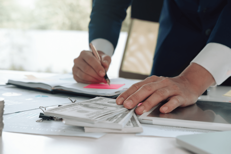 Man Analyzing Financial Costs 