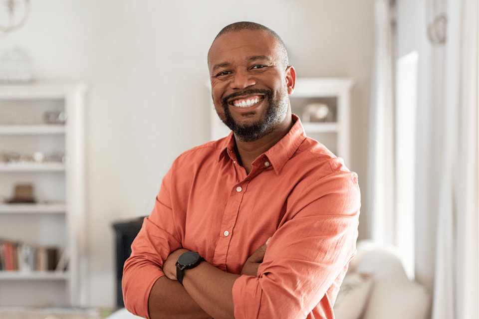 Smiling and Confident African American Man Dressed Casually 