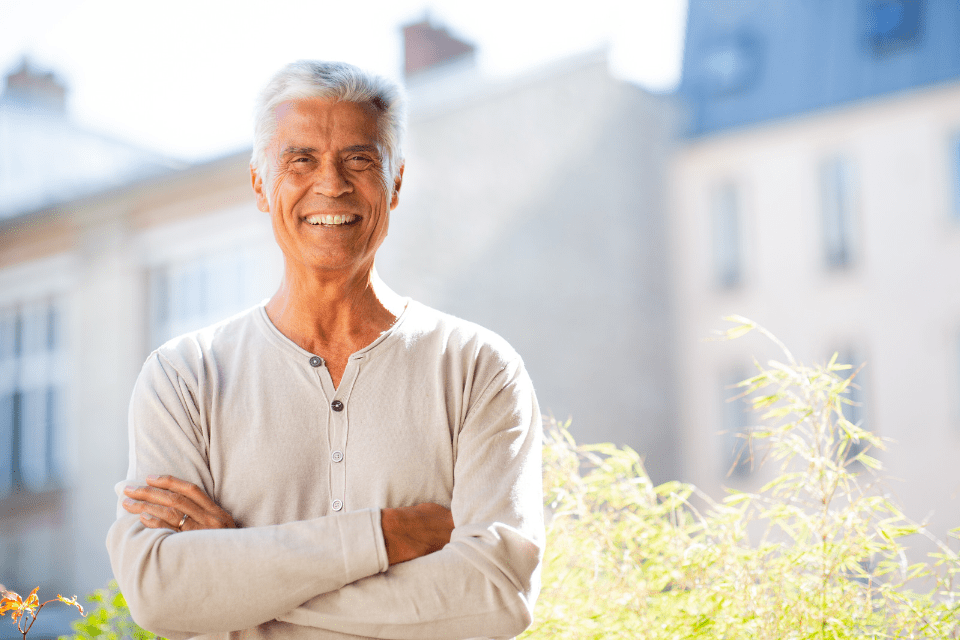 Smiling Mature Western Man with Arms Crossed