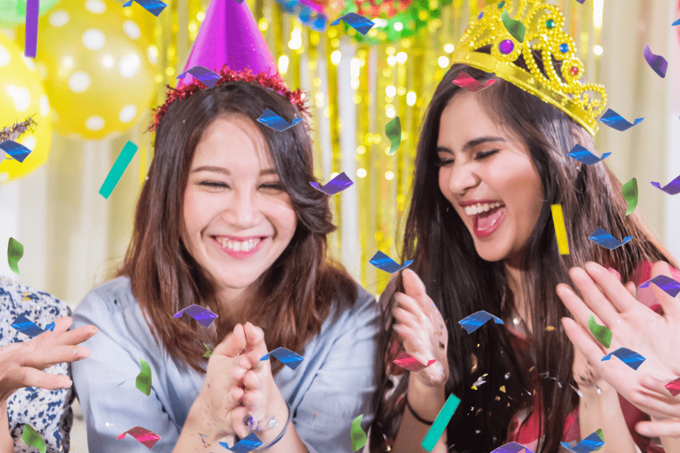 Cheerful Filipina Celebrating Her Birthday