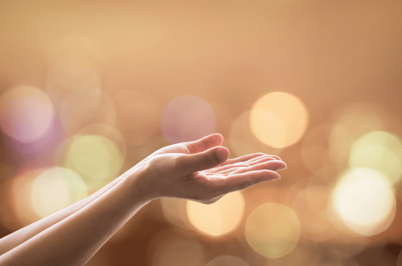 Christian Filipino Woman's Hands Praying for the Holy Spirit