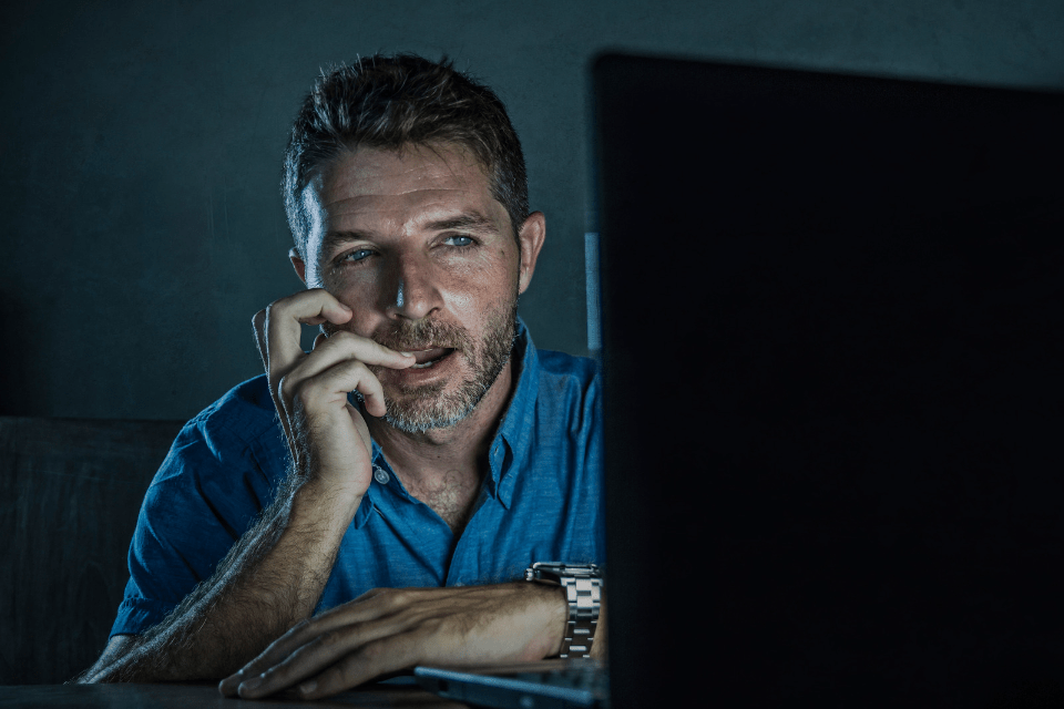 Man Watching Porn Online at Home Using His Laptop