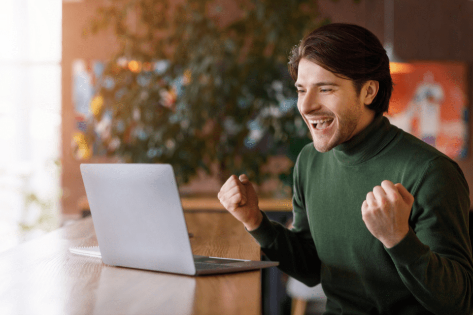 Excited man showing a genuine and authentic reaction.