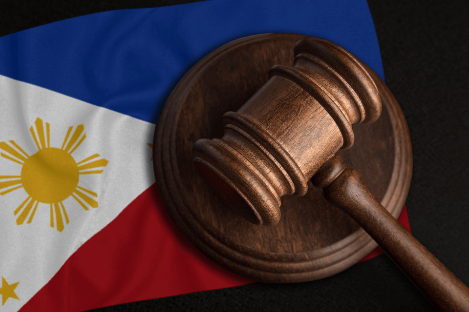 Judge gavel and Philippine flag representing the law on annulment of marriages.