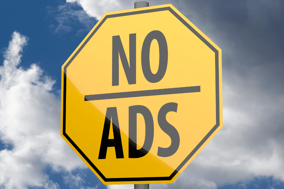 Yellow Yield Sign with the Words No Ads